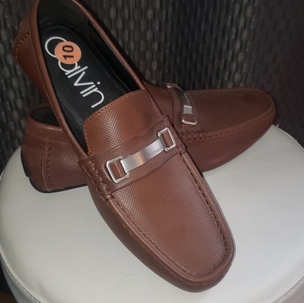 Brand new Calvin Klein driving shoes size 10 brown